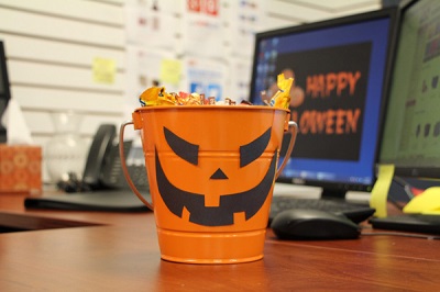 Halloween pail with candy in it
