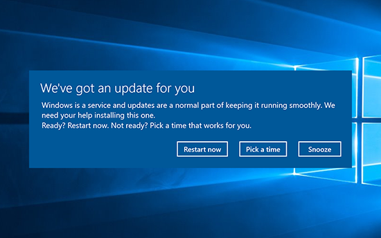 System update pop-up on a Windows desktop.